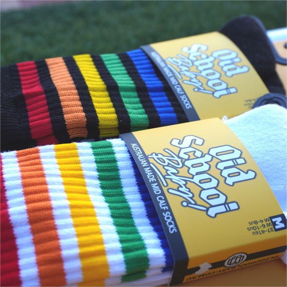 old school baby! white and black mid calf socks with rainbow stripes